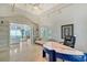 Spacious home office with a large marble desk and built-in shelving at 5444 Gulf Of Mexico Dr, Longboat Key, FL 34228