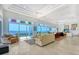 Bright and airy living room with floor to ceiling windows and water views at 5444 Gulf Of Mexico Dr, Longboat Key, FL 34228