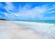 Scenic beach with white sand and gentle waves at 5444 Gulf Of Mexico Dr, Longboat Key, FL 34228
