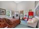 Bedroom with a comfortable bed and plenty of natural light at 5444 Gulf Of Mexico Dr, Longboat Key, FL 34228