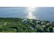 Luxury waterfront home surrounded by tropical landscape at 5444 Gulf Of Mexico Dr, Longboat Key, FL 34228