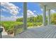 Spacious deck overlooking a tranquil waterfront landscape at 5444 Gulf Of Mexico Dr, Longboat Key, FL 34228