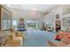 Spacious game room with ping pong table, comfy seating and water views at 5444 Gulf Of Mexico Dr, Longboat Key, FL 34228
