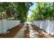 Long private driveway leading to secluded waterfront home at 5444 Gulf Of Mexico Dr, Longboat Key, FL 34228