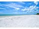 Expansive white sand beach with turquoise water at 5444 Gulf Of Mexico Dr, Longboat Key, FL 34228