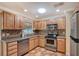 Well-equipped kitchen with modern appliances and tile flooring at 773 N Jefferson Ave # 773, Sarasota, FL 34237