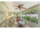Sunroom with comfortable seating and a ceiling fan at 773 N Jefferson Ave # 773, Sarasota, FL 34237