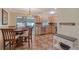 Kitchen with stainless steel appliances and light wood cabinets at 773 N Jefferson Ave # 773, Sarasota, FL 34237