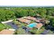 Aerial view showing home, pool, and surrounding community at 773 N Jefferson Ave # 773, Sarasota, FL 34237