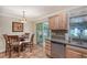 Kitchen features stainless steel appliances and wood cabinets at 773 N Jefferson Ave # 773, Sarasota, FL 34237