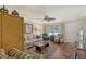 Living room featuring a sofa, chairs, and tiled floor at 773 N Jefferson Ave # 773, Sarasota, FL 34237