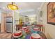 Dining area with a view into the living room and kitchen at 773 N Jefferson Ave # 773, Sarasota, FL 34237