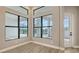 Sunroom or sitting room with views of the screened lanai and pool at 10629 Nicklaus Ct, Englewood, FL 34223