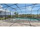 A screened in pool offers a relaxing and private atmosphere at 10629 Nicklaus Ct, Englewood, FL 34223