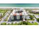 Oceanfront building with parking and lush landscaping at 2045 Gulf Of Mexico Dr # M1-214, Longboat Key, FL 34228