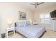 Bright bedroom with a patterned bedspread, vanity and natural light at 2825 Terra Ceia Bay Blvd # 1602, Palmetto, FL 34221