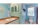 Bathroom with toilet, sink, and shower/tub combo at 930 Mill Creek Rd, Bradenton, FL 34212