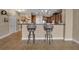 Kitchen with breakfast bar and two stylish bar stools at 2825 Terra Ceia Bay Blvd # 1602, Palmetto, FL 34221
