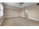 Bright bedroom featuring a ceiling fan and access to a balcony at 2825 Terra Ceia Bay Blvd # 1602, Palmetto, FL 34221