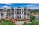 Condo building with pool and lush landscaping at 2825 Terra Ceia Bay Blvd # 1602, Palmetto, FL 34221