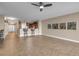 Open living room with kitchen views, tile floors and ceiling fan at 2825 Terra Ceia Bay Blvd # 1602, Palmetto, FL 34221