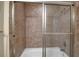 Shower and tub with neutral tile surround at 2825 Terra Ceia Bay Blvd # 1602, Palmetto, FL 34221