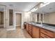 Double vanity bathroom with granite countertops and large mirror at 2825 Terra Ceia Bay Blvd # 1602, Palmetto, FL 34221