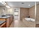 Spa-like bathroom featuring a spacious shower and a relaxing whirlpool tub at 2825 Terra Ceia Bay Blvd # 1602, Palmetto, FL 34221