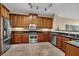 Modern kitchen with stainless steel appliances and dark wood cabinets at 2825 Terra Ceia Bay Blvd # 1602, Palmetto, FL 34221