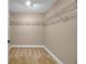 Spacious walk-in closet with wire shelving and carpeted flooring at 2825 Terra Ceia Bay Blvd # 1602, Palmetto, FL 34221