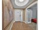 Bright entryway with tiled floor and chandelier at 2825 Terra Ceia Bay Blvd # 1602, Palmetto, FL 34221