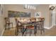 Dining room features a table with six chairs and wall art at 2825 Terra Ceia Bay Blvd # 1602, Palmetto, FL 34221