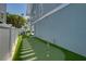 Artificial turf putting green beside the house at 2102 Avenue B, Bradenton Beach, FL 34217