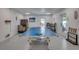 Game room with ping pong table and ice maker at 2102 Avenue B, Bradenton Beach, FL 34217