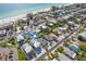 Aerial view of beach house near the ocean in a residential neighborhood at 2102 Avenue B, Bradenton Beach, FL 34217