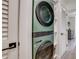Stackable washer and dryer in a small closet at 2102 Avenue B, Bradenton Beach, FL 34217