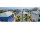 Aerial view showcasing a charming beach house and neighborhood at 2102 Avenue B, Bradenton Beach, FL 34217