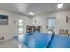 Game room with ping pong table and pool access at 2102 Avenue B, Bradenton Beach, FL 34217