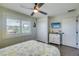 Bedroom with queen bed, white dresser, and coastal decor at 2102 Avenue B, Bradenton Beach, FL 34217