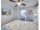 Bedroom with a queen bed, en-suite bathroom and TV at 2102 Avenue B, Bradenton Beach, FL 34217
