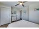 Guest bedroom with white dresser and built-in TV at 2102 Avenue B, Bradenton Beach, FL 34217