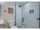 Bathroom with shower, toilet, and vanity with quartz countertop at 2102 Avenue B, Bradenton Beach, FL 34217