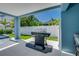 Built-in gas grill on patio next to the pool at 2102 Avenue B, Bradenton Beach, FL 34217