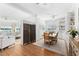 Spacious dining area with hardwood floors and room divider at 750 Penfield St, Longboat Key, FL 34228