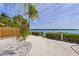 Enjoy this paved patio area perfect for outdoor dining at 750 Penfield St, Longboat Key, FL 34228