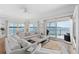 Living room with water views and comfortable seating at 750 Penfield St, Longboat Key, FL 34228