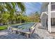 Resort-style pool with spa and patio area at 750 Penfield St, Longboat Key, FL 34228