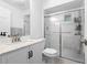 Clean bathroom, shower, vanity, and toilet at 750 Penfield St, Longboat Key, FL 34228