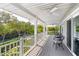 Relax on this spacious deck overlooking the water at 750 Penfield St, Longboat Key, FL 34228