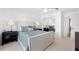 Comfortable bedroom with a queen bed and mirrored closet at 750 Penfield St, Longboat Key, FL 34228